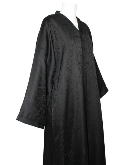 Abaya noire fluide avec un tissu