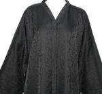 Abaya noire fluide avec un tissu