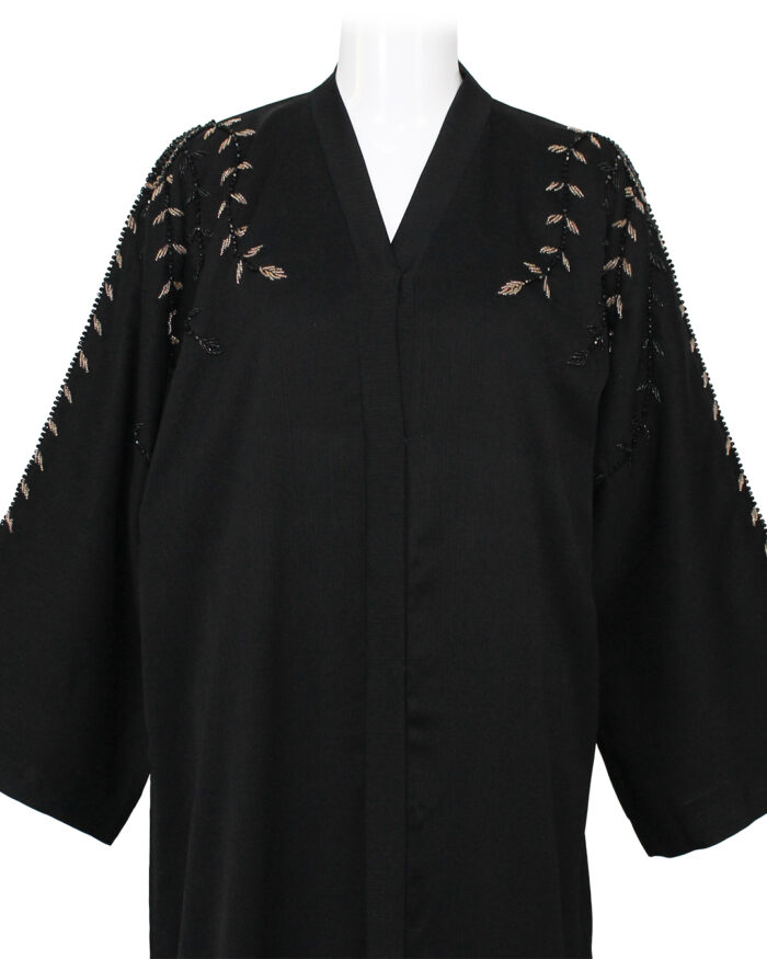 Abaya Dubai Noire aux Motifs Perlés : Une Touche d’Élégance