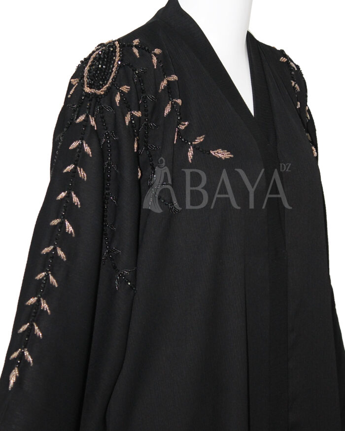 Abaya Dubai Noire aux Motifs Perlés : Une Touche d’Élégance