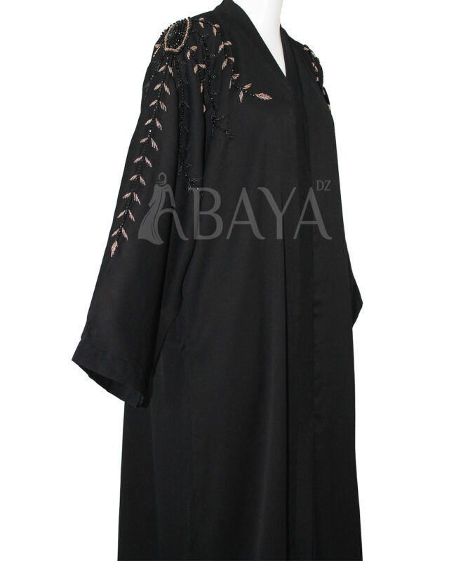 Abaya Dubai Noire aux Motifs Perlés : Une Touche d’Élégance