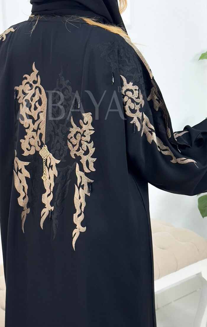 Abaya Dubai noire chic en tissu Nida avec broderie élégante