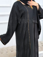 Abaya Noire avec Robe : Simplicité et Élégance Intemporelle