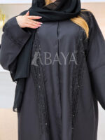 Abaya noire élégante ornée de perles délicates